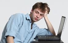 frustrated teen boy at computer